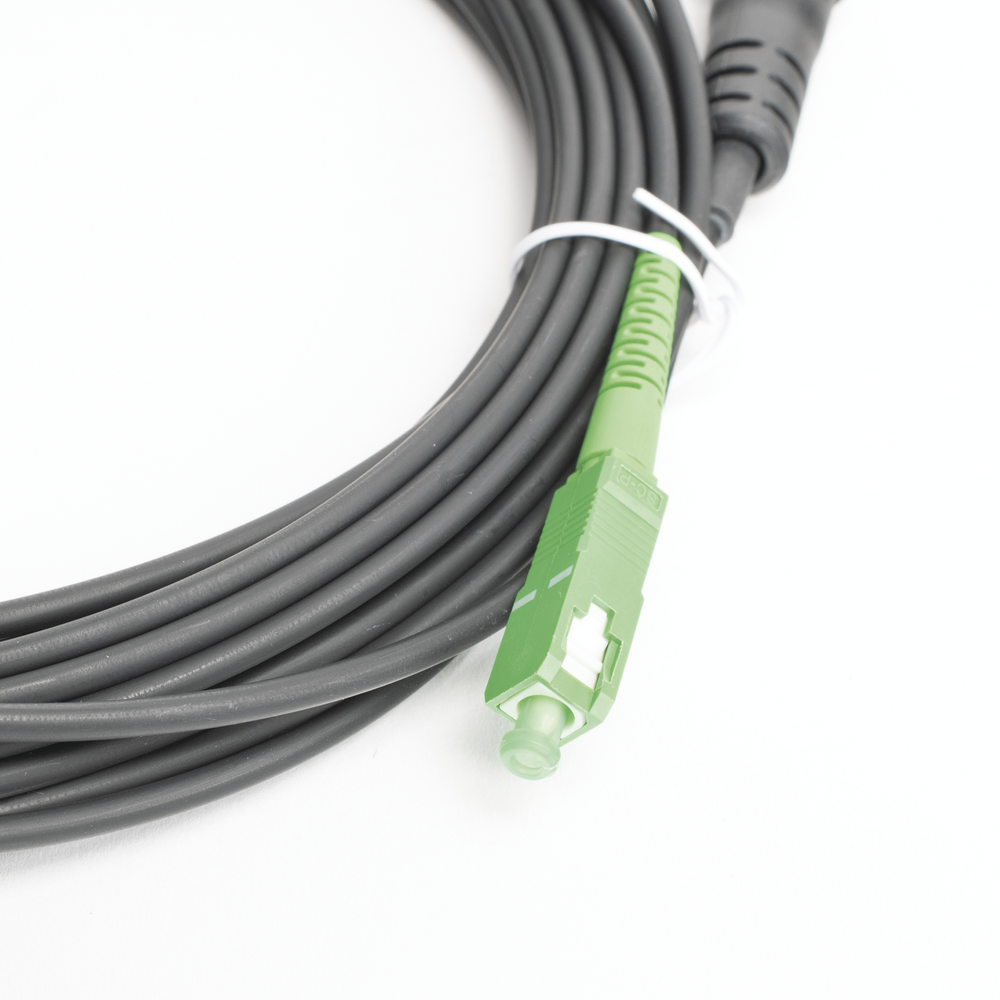 Jumper de Fibra Óptica, Conector SC/APC - Conexión a Caja FDP460, Redondo, 10 Metros (32.81 Pies), Forro 3 mm, G657A2, Negro