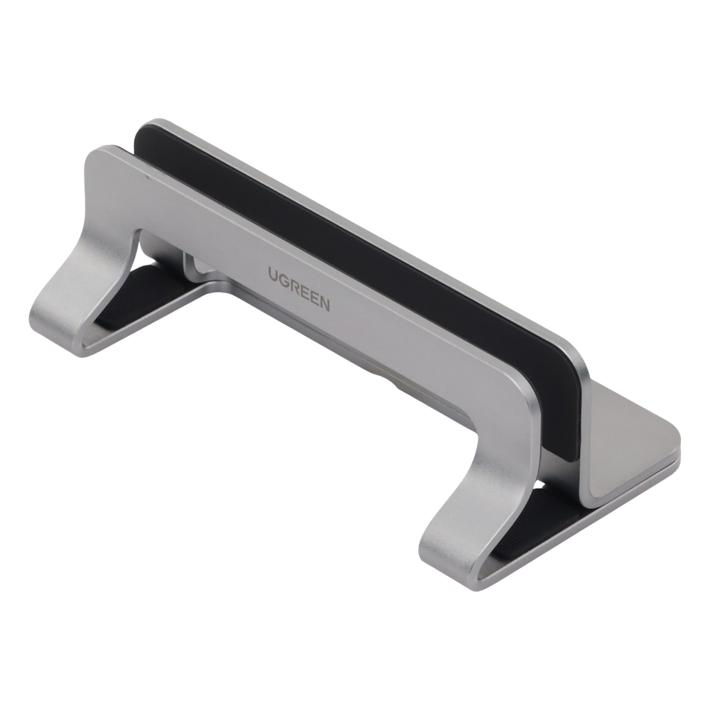 Soporte Vertical para Laptop / Adecuado para escritorio / Anchura Ajustable (12-26mm) / Amplia compatibilidad / Anti-Arañazos / Anti-Deslizante /Ajustable Mediante Tornillos / Color Plata / Aluminio + Silicona